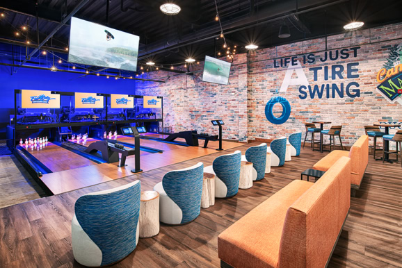 Large-scale entertainment space capturing lighting, seating, and guest activity within a hospitality venue.